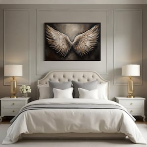 a luxurious bedroom with a large bed, white bedding, and a framed artwork of a winged creature on the wall. The room has a neutral color scheme with white walls, a gray carpet, and white furniture, creating a serene and elegant atmosphere.
