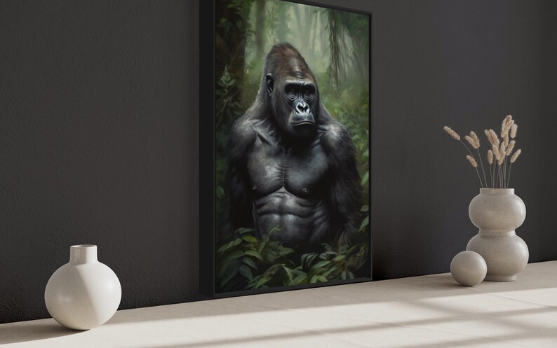 a large framed painting of a gorilla in a lush, green jungle setting. The painting is displayed on a wall, with a white vase and a small white sculpture placed next to it.