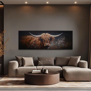 a large, brown cow with horns on the wall, serving as a striking focal point in a modern living room setting.