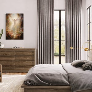 a serene and modern bedroom with a large bed, wooden furniture, and a painting of an angel on the wall.