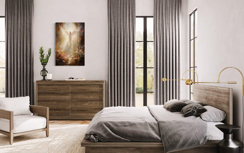 a serene and modern bedroom with a large bed, wooden furniture, and a painting of an angel on the wall.