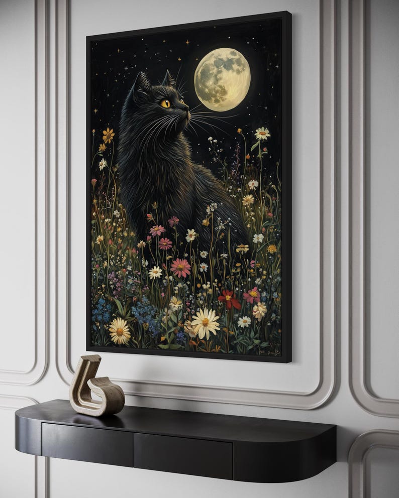 a black cat sitting in a field of flowers under a full moon.