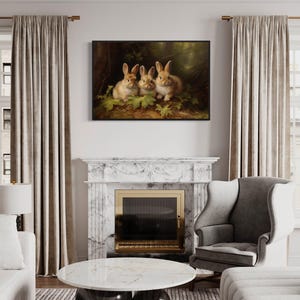 a cozy living room with a fireplace, a painting of three rabbits, and a marble fireplace surround. The room is furnished with a sofa, a chair, and a coffee table. The overall atmosphere of the room is warm and inviting, with the painting of the rabbits adding a touch of nature and charm to the space.