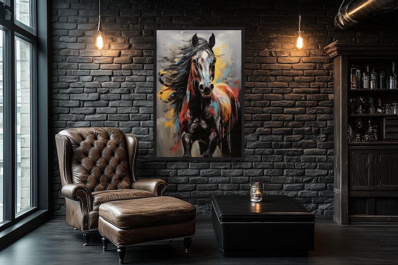 a cozy living room with a leather armchair, a wooden coffee table, and a large painting of a horse on the brick wall. The room has a rustic, industrial aesthetic with exposed brick walls and a brick fireplace.