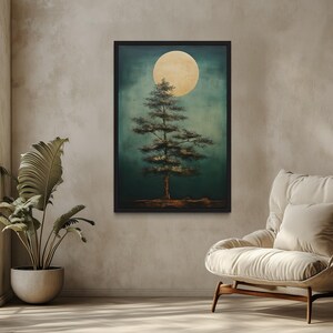 a serene indoor setting with a large framed painting of a tree under a full moon hanging on the wall. The painting is surrounded by potted plants, creating a tranquil and natural atmosphere. In the foreground, there is a comfortable chair, and the room is illuminated by natural light coming through a window.