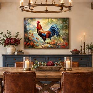 May include: A rectangular wall art print featuring a vibrant rooster with red, orange, and blue plumage standing in a forest setting with autumn leaves. The artwork is framed in a dark wood border and displayed above a long, dark blue wooden sideboard.