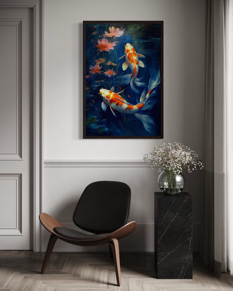 a serene indoor setting with a framed painting of two koi fish swimming in a pond, a black leather chair, and a vase of white flowers on a black pedestal.