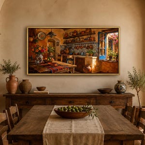 May include: A rectangular wall art print depicting a rustic kitchen interior with warm orange and brown tones, featuring a wooden table, hanging copper cookware, blue window frames, and a vibrant floral arrangement, all framed in a thin gold border.
