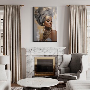 a living room with a large painting of a woman's face hanging on the wall above a fireplace. The room has a white marble fireplace mantel, a gray armchair, and a round marble coffee table. The overall decor has a modern and elegant style.