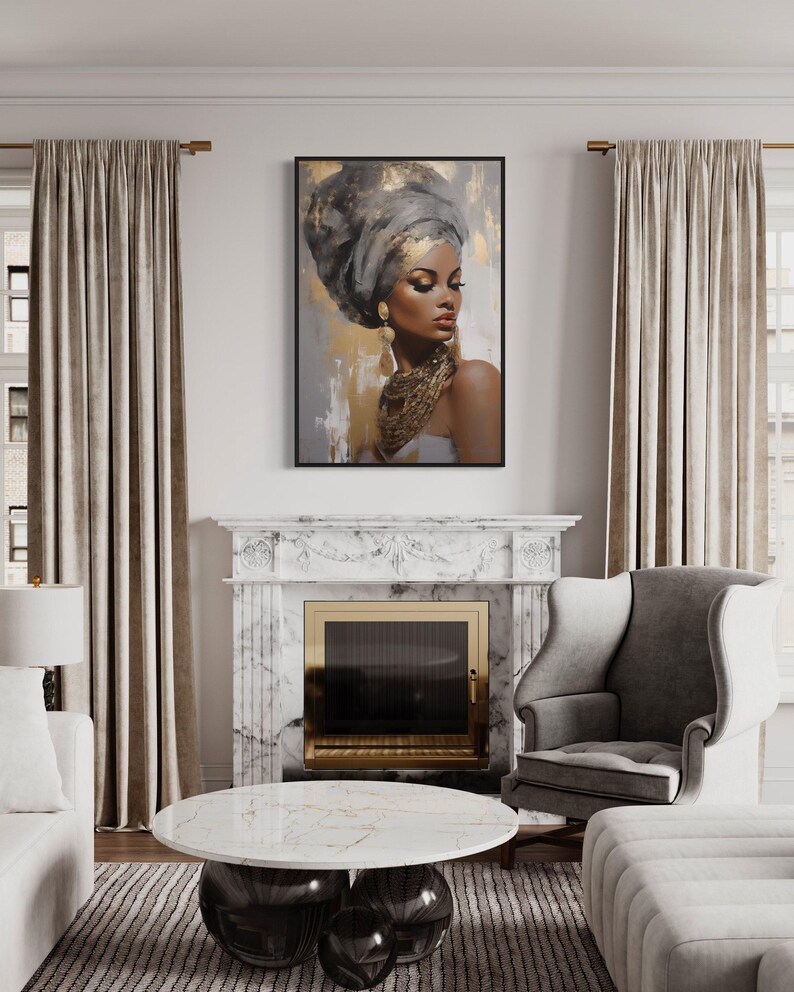 a living room with a large painting of a woman's face hanging on the wall above a fireplace. The room has a white marble fireplace mantel, a gray armchair, and a round marble coffee table. The overall decor has a modern and elegant style.