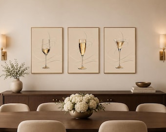 Peut inclure: Un ensemble de trois affiches murales rectangulaires représentant un verre à vin, une flûte à champagne et un verre à martini, centrés sur un fond beige avec des lignes blanches fluides et délicates, dans de fins cadres dorés.