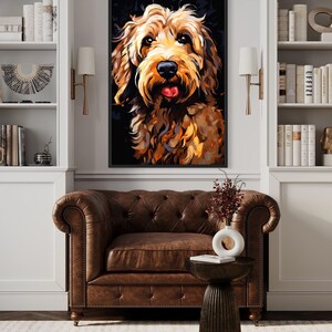 a large, colorful painting of a dog's face hanging on a wall in a living room. The dog appears to be a golden retriever, with a playful expression. The room is decorated with white bookshelves, a brown leather armchair, and a wooden side table. The overall atmosphere of the room is cozy and inviting, with the dog painting being the focal point.