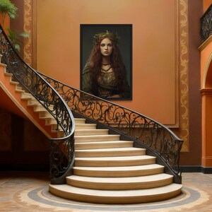 a grand staircase with ornate railings and a large portrait of a woman hanging on the wall above it. The staircase is set against a backdrop of orange walls and arches, creating an elegant and majestic atmosphere.