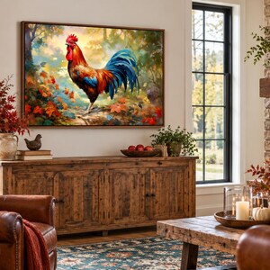 May include: A rectangular wall art print featuring a vibrant rooster with red, orange, and blue plumage standing in a forest setting with autumn leaves. The artwork is enclosed in a thin brown frame and displayed above a wooden sideboard.