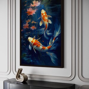 a framed painting of two koi fish swimming in a pond, surrounded by pink flowers.