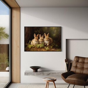 a cozy living room with a large painting of three rabbits on the wall, a brown leather armchair, and a small table with a plant on it.