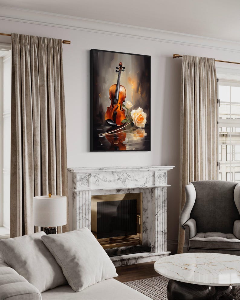 a living room with a white fireplace, a gray armchair, and a white sofa. Above the fireplace is a framed painting of a violin and a rose.