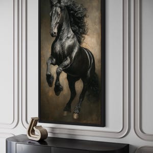 a large black horse with flowing mane and tail, standing on its hind legs, creating a dynamic and powerful visual effect.