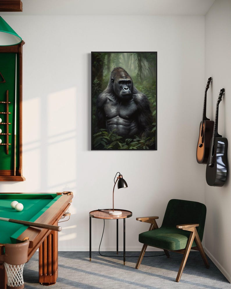 a room with a pool table, a guitar, and a framed picture of a gorilla.