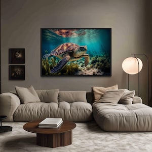 a large, colorful painting of a sea turtle swimming in the ocean, hanging on the wall above a beige sofa in a cozy living room setting.