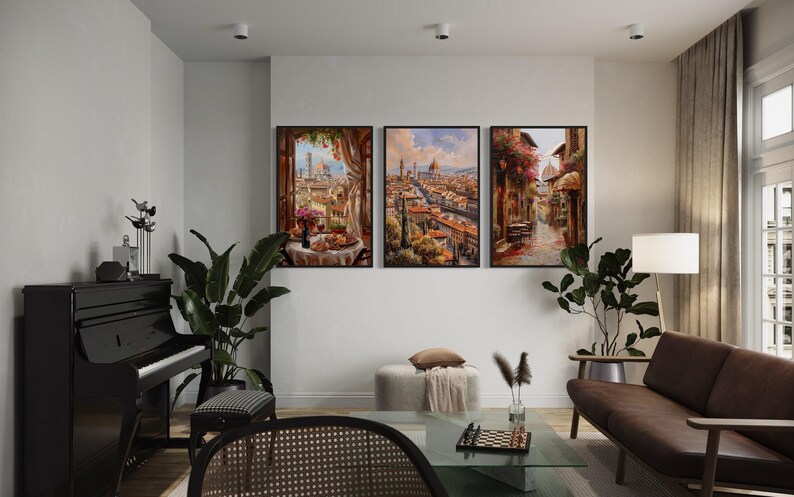a cozy living room with a piano, a sofa, and three framed paintings hanging on the wall.