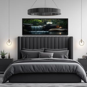 a modern bedroom with a large bed, a black headboard, and a framed landscape painting of a waterfall and flowers above it. The room is decorated with potted plants and has a minimalist, stylish design.