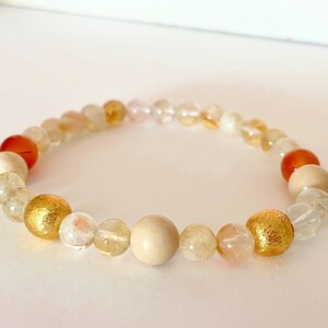 Kralenarmband citrien carneool en jaspis natuurlijke edelstenen energie sieraden handgemaakt cadeau unieke intentie overvloed welvaart armband