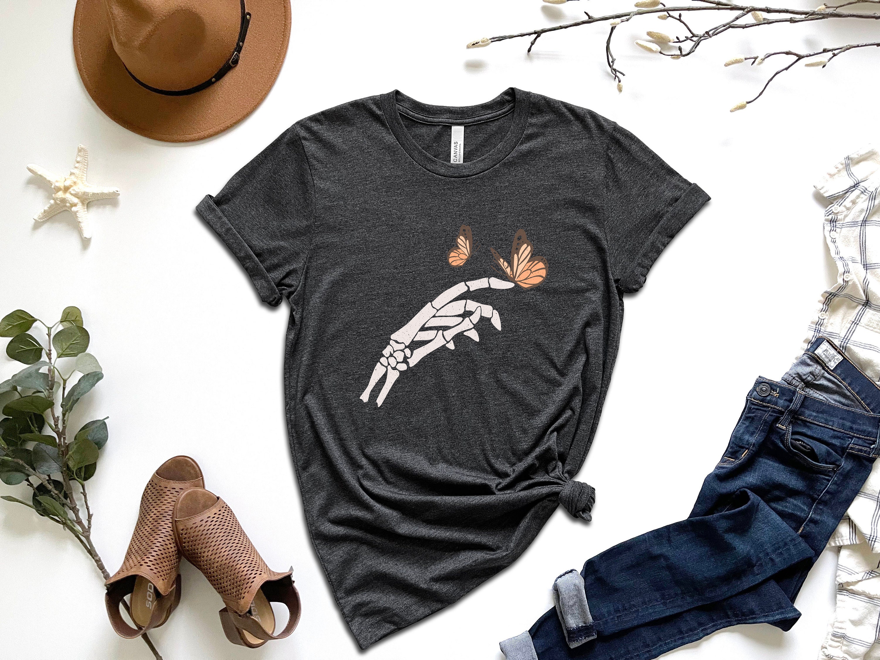 Discover Floral Butterfly Skeleton Hand T-shirt, Butterfly Shirt, Skeleton Shirt, Skeleton Hand Tee, Floral Shirt, Trendy Shirt, Ladies Funny Shirt