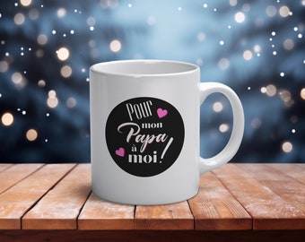 May include: White ceramic mug with a black circle and the text "Pour mon Papa à moi!" in white with two pink hearts.