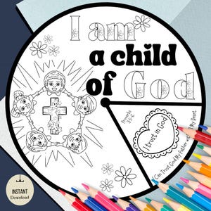 May include: Black and white circular coloring page with the text "I am a child of God." The design includes children holding hands around a cross, flowers, and a heart with the words "I trust in God." Colored pencils are in the foreground.