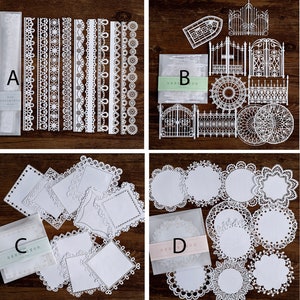 Puede incluir: Cuatro juegos de servilletas y bordes de encaje de papel blanco. El primer juego es una colecci&oacute;n de 20 bordes de encaje diferentes. El segundo juego es una colecci&oacute;n de 10 dise&ntilde;os de portales de metal diferentes. El tercer juego es una colecci&oacute;n de 10 servilletas de encaje diferentes. El cuarto juego es una colecci&oacute;n de 10 servilletas de encaje diferentes.
