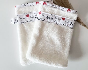 Pack of two very soft adult washcloths in white bamboo sponge with feminine pattern in support of women