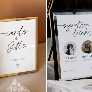 Peut inclure: Deux pancartes de mariage avec une calligraphie noire. La premi&egrave;re pancarte est dans un cadre dor&eacute; et dit "cartes & cadeaux" avec "merci !" et un c&oelig;ur en dessous. La deuxi&egrave;me pancarte est dans un cadre noir et dit "boissons signature" avec deux photos de chiens et leurs noms et choix de boissons en dessous.