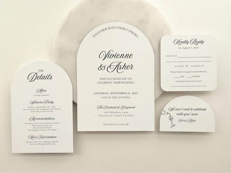 May include: Elegant wedding invitation suite with arched and rounded cards. The main card announces the wedding of Vivienne & Asher on September 21, 2025. Additional cards include details, RSVP, and a thank you message.