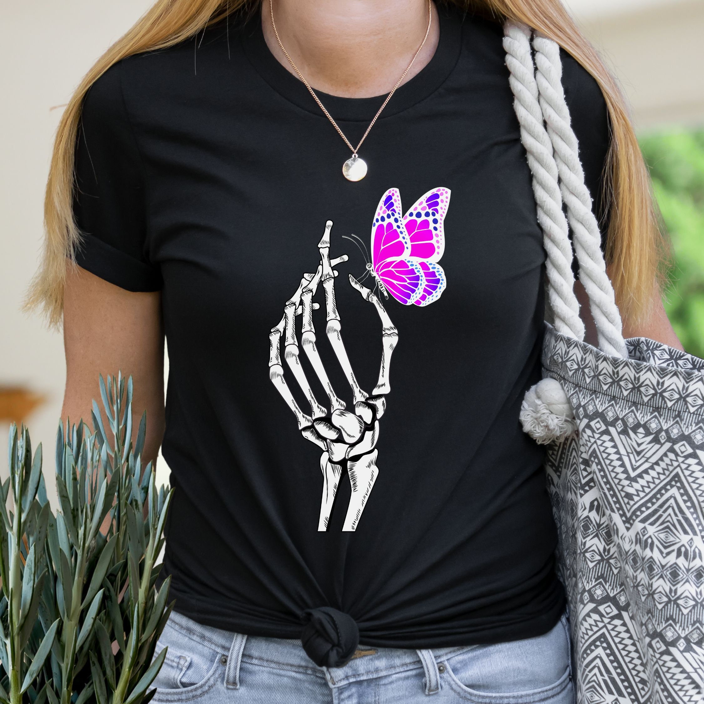 Discover Skeleton Hand Butterfly Shirt | Goblincore T Shirt | Fairycore T shirt | Mom Birthday Gift | Grunge Shirt | Gift for her | Spooky Shirt