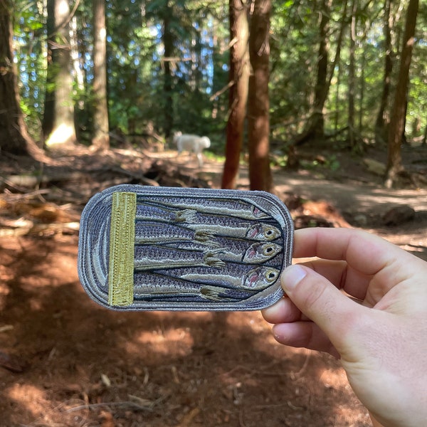 iron-on 5” x 3” embroidered “Sardine Can” patch.