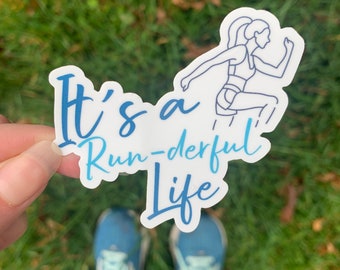 May include: White sticker with a blue outline of a person running and the text "It's a Run-derful Life".