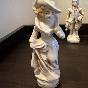 Vintage hand painted porcelain figurine. Made in occupied Japan