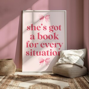 pink wall art featuring the quote She’s Got a Book for Every Situation with feminine bow accents, perfect for book lovers, reading nooks, and cozy decor. Book Merch, Harry Styles Merch, Bookish Prints, Coquette Decor,Aestethic wall art
