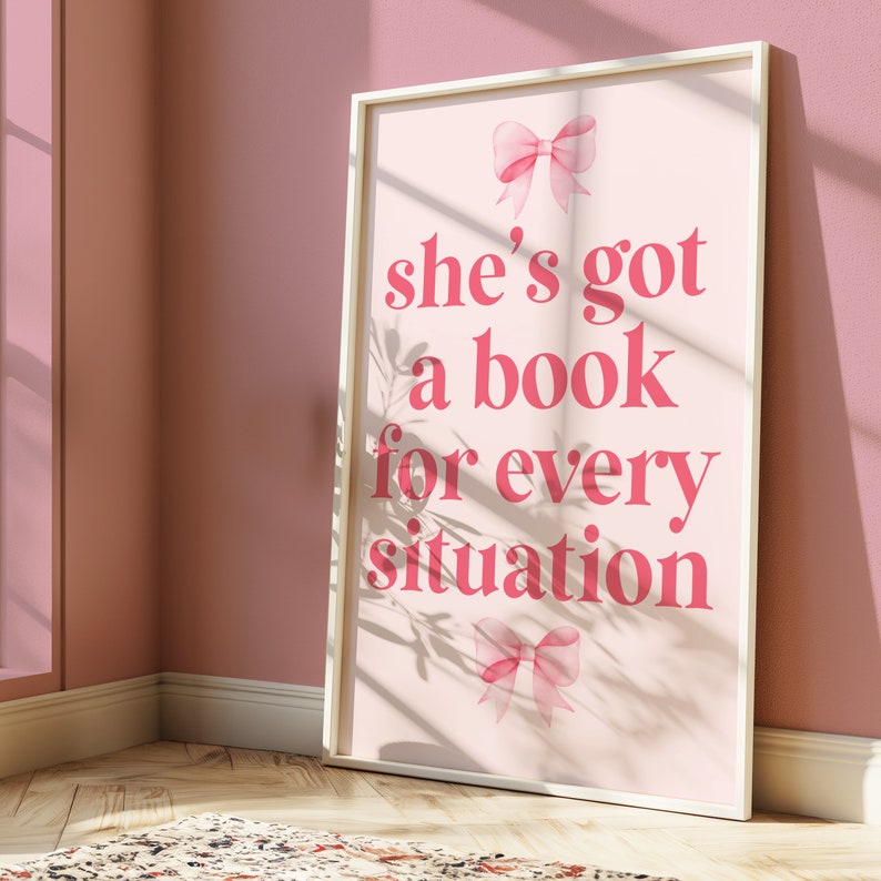 pink wall art featuring the quote She’s Got a Book for Every Situation with feminine bow accents, perfect for book lovers, reading nooks, and cozy decor. Book Merch, Harry Styles Merch, Bookish Prints, Coquette Decor,Aestethic wall art