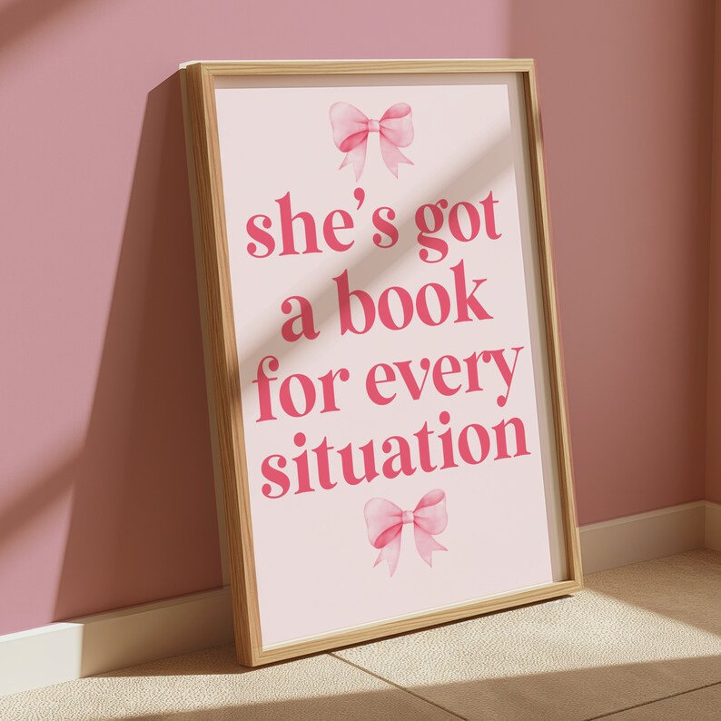 pink wall art featuring the quote She’s Got a Book for Every Situation with feminine bow accents, perfect for book lovers, reading nooks, and cozy decor. Book Merch, Harry Styles Merch, Bookish Prints, Coquette Decor,Aestethic wall art