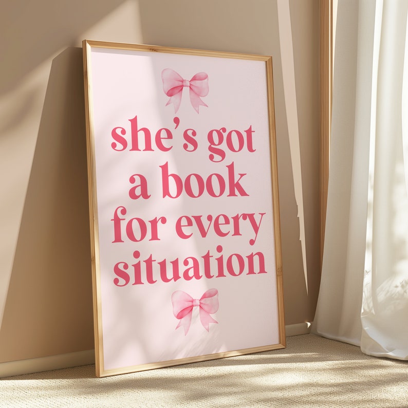 pink wall art featuring the quote She’s Got a Book for Every Situation with feminine bow accents, perfect for book lovers, reading nooks, and cozy decor. Book Merch, Harry Styles Merch, Bookish Prints, Coquette Decor,Aestethic wall art