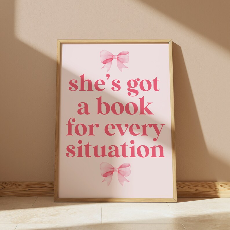 pink wall art featuring the quote She’s Got a Book for Every Situation with feminine bow accents, perfect for book lovers, reading nooks, and cozy decor. Book Merch, Harry Styles Merch, Bookish Prints, Coquette Decor,Aestethic wall art