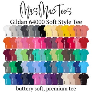 May include: A display of Gildan 64000 Soft Style tees in various colors, including white, black, and shades of blue, green, and red. The text "Mrs MacTees" and "buttery soft, premium tee" are also visible.