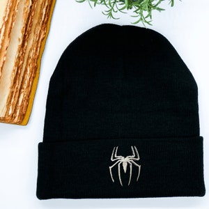 Stylish Embroidered Black Beanie Featuring Iconic Superhero Design