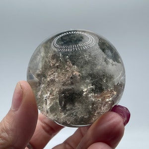 Stunning garden quartz enhydro sphere with flowing chlorite inclusion