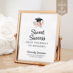 May include: A gold-framed sign with a white background and black text. The sign says "Sweet Success" and "Help Yourself to Dessert!" with a graduation cap and floral design. The sign also includes the name "Kennedy Jameson", "DePauw University", and "Class of 20XX".