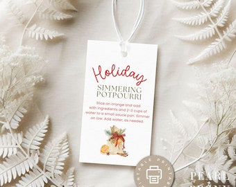 May include: Printable gift tag with a watercolor illustration of a burlap sack filled with oranges, cinnamon sticks, and cloves. The tag has the text "Holiday Simmering Potpourri" and instructions for making a simmering potpourri.