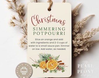 May include: Printable Christmas simmering potpourri recipe tag with a watercolor illustration of orange slices, cinnamon sticks, cloves, and greenery. The tag has the text "Christmas Simmering Potpourri" and instructions for making the potpourri.