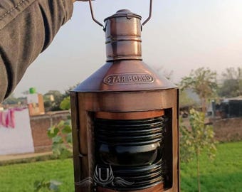 Lampada a olio nautica in metallo: finitura anticata in rame, lanterna di dritta e di sinistra